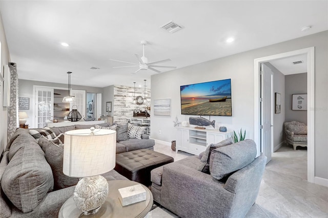 12291 Myrtle Bay Ct, Sarasota, FL 34238 - living room with a ceiling fan and recessed lighting