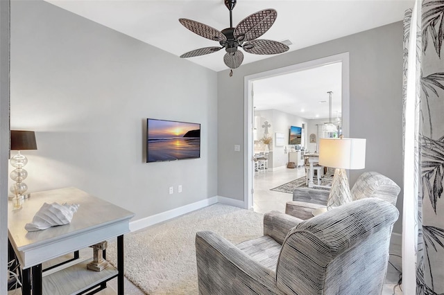 12291 Myrtle Bay Ct, Sarasota, FL 34238 - living area featuring ceiling fan and baseboards