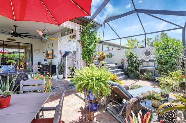 12291 Myrtle Bay Ct, Sarasota, FL 34238 - view of patio featuring a ceiling fan and glass enclosure