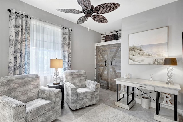12291 Myrtle Bay Ct, Sarasota, FL 34238 - living area with a ceiling fan