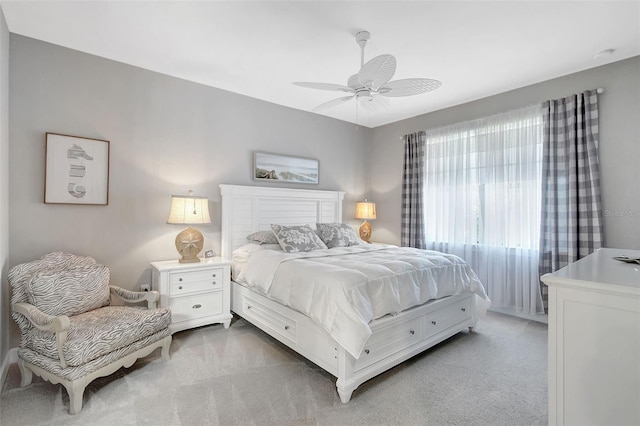 12291 Myrtle Bay Ct, Sarasota, FL 34238 - bedroom with light carpet and a ceiling fan