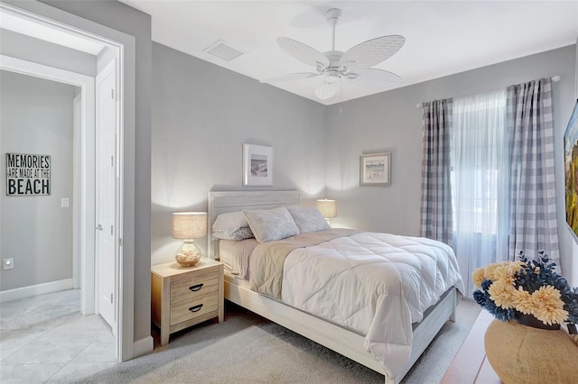 12291 Myrtle Bay Ct, Sarasota, FL 34238 - bedroom with baseboards and ceiling fan