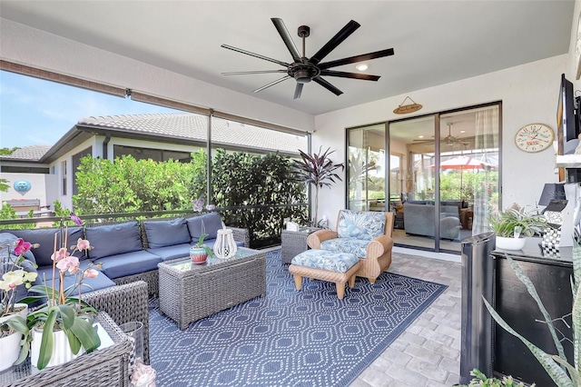 12291 Myrtle Bay Ct, Sarasota, FL 34238 - sunroom with ceiling fan and an outdoor hangout area