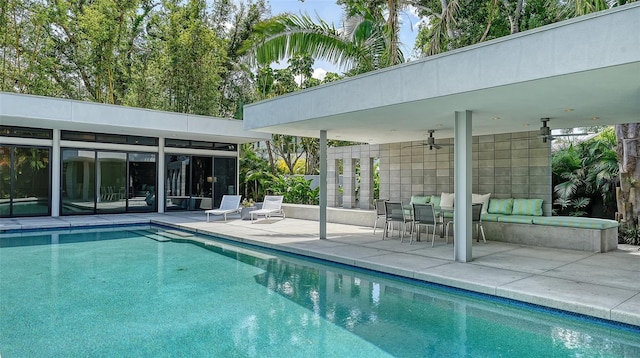 pool featuring a patio and ceiling fan