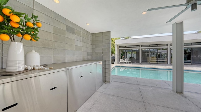 pool featuring a ceiling fan