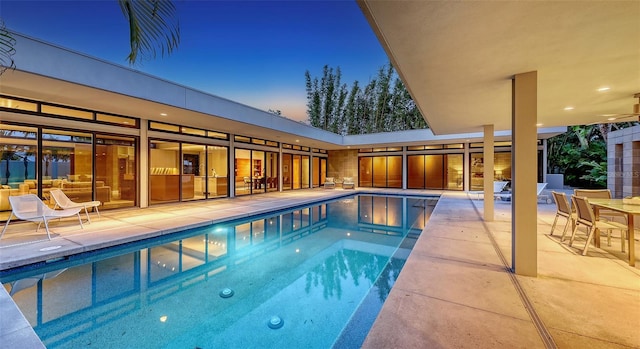 outdoor pool featuring a patio area