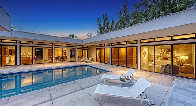 pool featuring a patio area