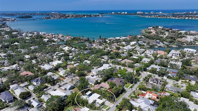 bird's eye view with a residential view and a water view
