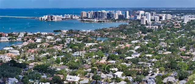 aerial view featuring a view of city and a water view