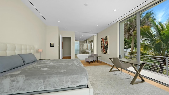 4123 Bay Shore Rd, Sarasota, FL 34234 - bedroom featuring light wood-style floors and recessed lighting