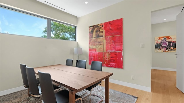 4123 Bay Shore Rd, Sarasota, FL 34234 - dining area with wood finished floors, recessed lighting, and baseboards