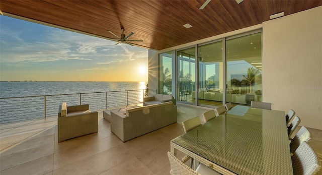 4123 Bay Shore Rd, Sarasota, FL 34234 - balcony featuring a water view and an outdoor living space