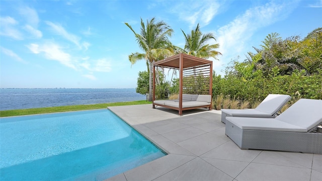4123 Bay Shore Rd, Sarasota, FL 34234 - swimming pool with a patio area, a water view, and outdoor lounge area