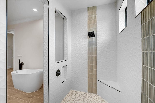 full bath featuring recessed lighting, tiled shower, crown molding, a freestanding bath, and wood finished floors