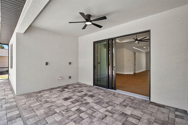view of patio / terrace featuring a ceiling fan