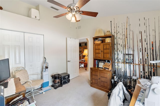 bedroom featuring visible vents, a ceiling fan, a closet, and carpet