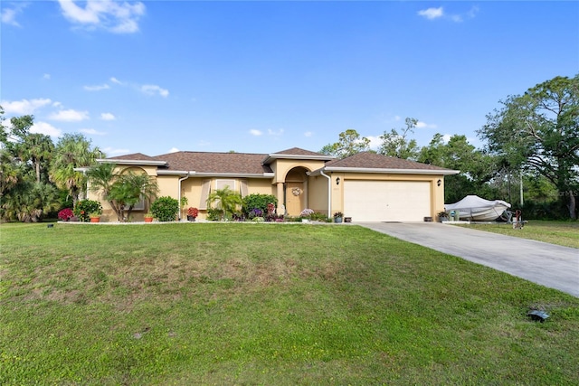 mediterranean / spanish-style house featuring a front yard, stucco siding, driveway, and an attached garage