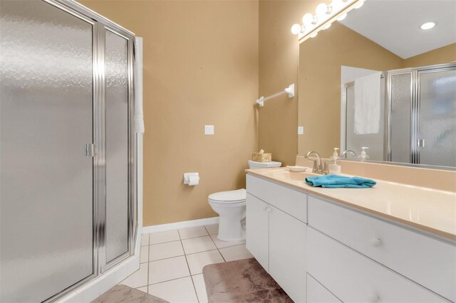 3640 Gloxinia Dr, North Fort Myers, FL 33917 - full bathroom with tile patterned flooring, a shower stall, toilet, vanity, and baseboards