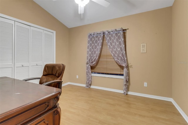 3640 Gloxinia Dr, North Fort Myers, FL 33917 - home office featuring baseboards, a ceiling fan, lofted ceiling, and light wood-style flooring