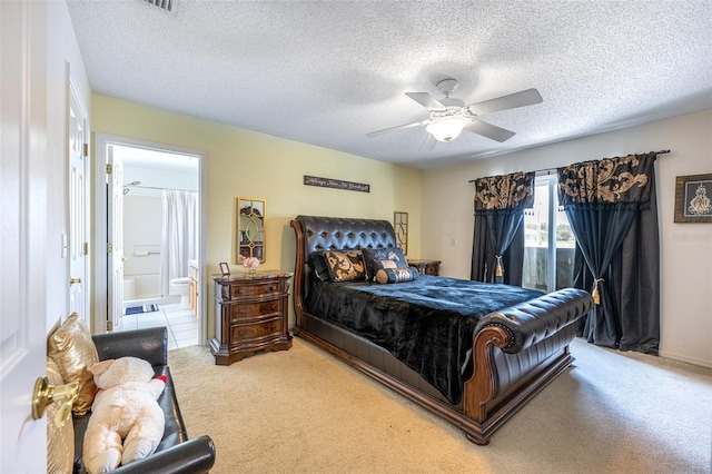 12026 Warwick Cir, Parrish, FL 34219 - bedroom with access to outside, carpet flooring, a textured ceiling, ensuite bathroom, and a ceiling fan