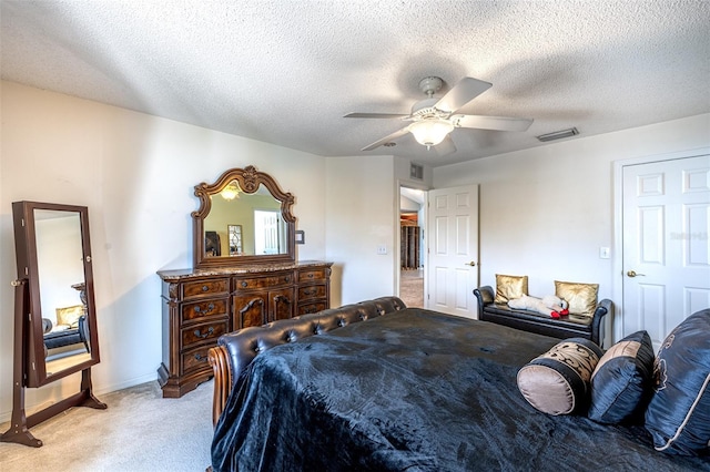 12026 Warwick Cir, Parrish, FL 34219 - bedroom with light carpet, a textured ceiling, and ceiling fan