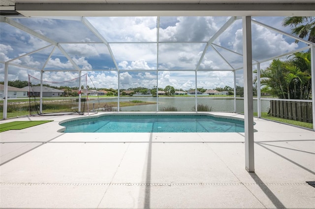 12026 Warwick Cir, Parrish, FL 34219 - swimming pool featuring a patio area, a water view, and glass enclosure