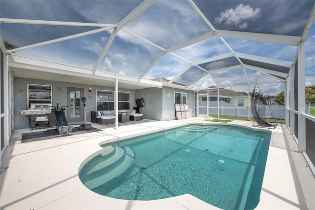 12026 Warwick Cir, Parrish, FL 34219 - view of swimming pool with outdoor lounge area, a patio, and a lanai