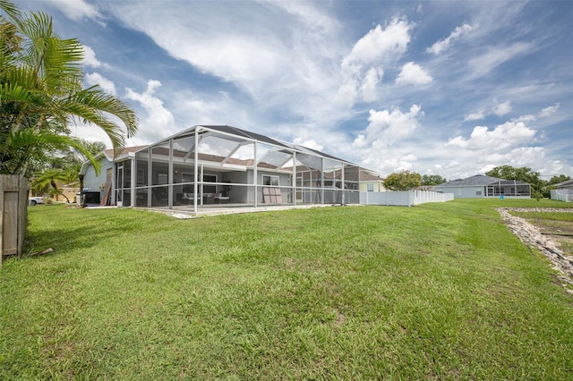 12026 Warwick Cir, Parrish, FL 34219 - rear view of house featuring a lanai