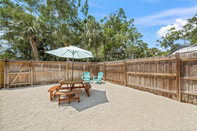 2537 Ashton Rd, Sarasota, FL 34231 - view of yard with a patio and a fenced backyard