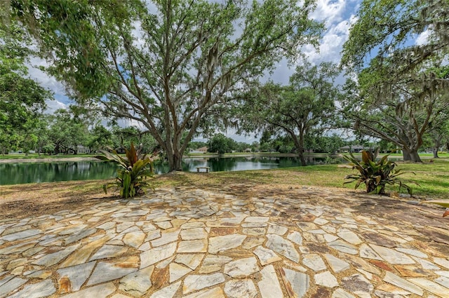 view of patio / terrace with a water view