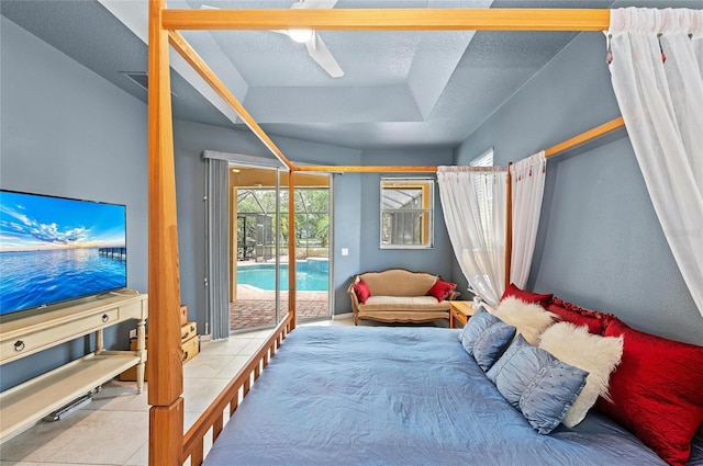 tiled bedroom with a ceiling fan and access to exterior