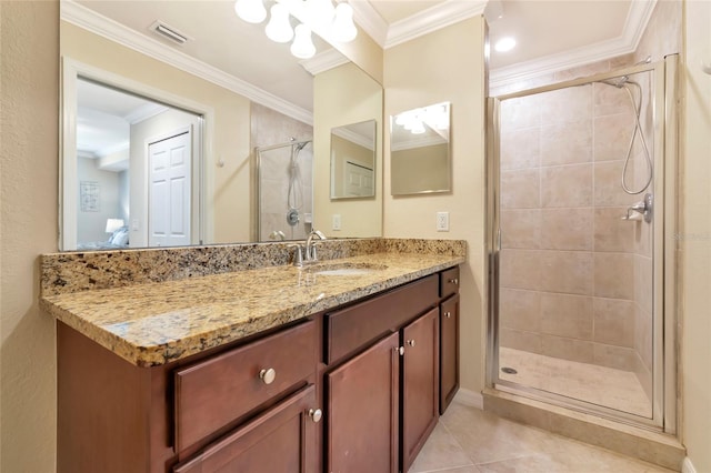 bathroom featuring tile patterned floors, a shower stall, ornamental molding, vanity, and visible vents