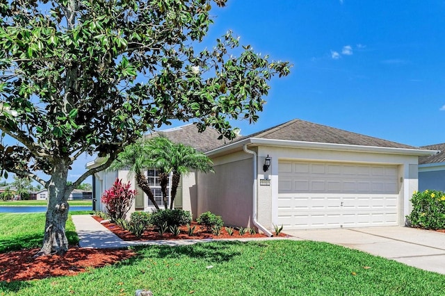 ranch-style home featuring stucco siding, concrete driveway, a front yard, and a garage