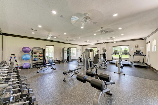 workout area with visible vents, recessed lighting, a ceiling fan, and a textured ceiling