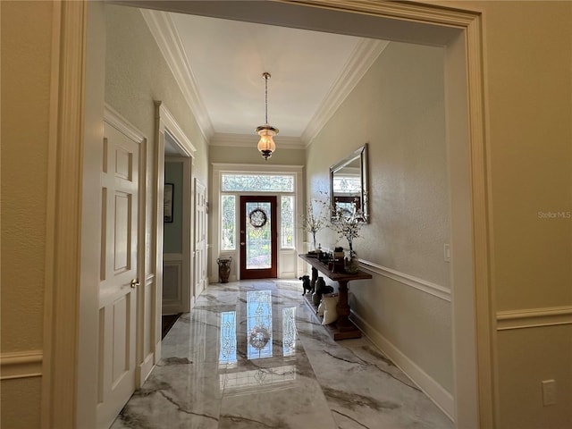 708 E Main St, Wauchula, FL 33873 - entryway with crown molding, marble finish floor, and wainscoting