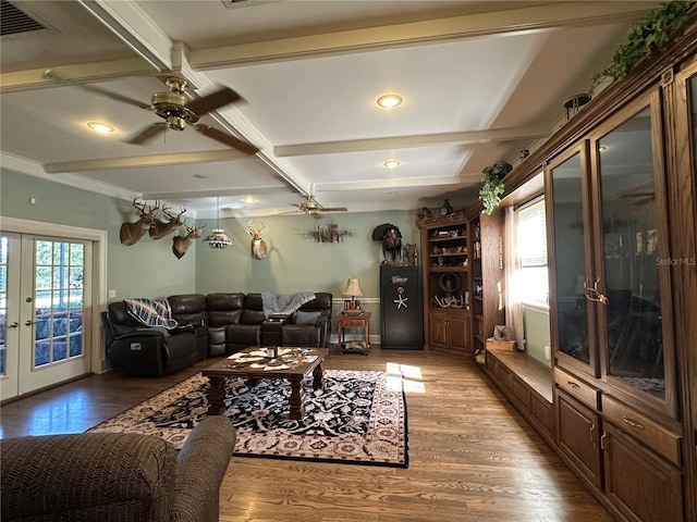 708 E Main St, Wauchula, FL 33873 - living area featuring ceiling fan, beam ceiling, light wood-style flooring, and a healthy amount of sunlight