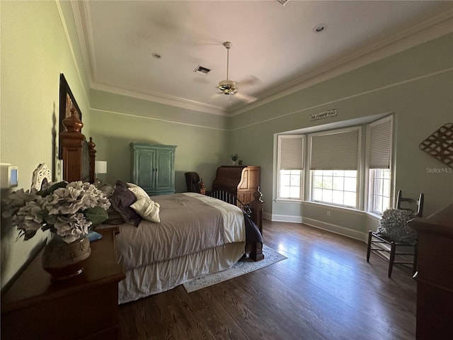 708 E Main St, Wauchula, FL 33873 - bedroom featuring ornamental molding, baseboards, visible vents, and wood finished floors