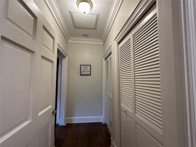 708 E Main St, Wauchula, FL 33873 - corridor with crown molding, baseboards, visible vents, and dark wood finished floors