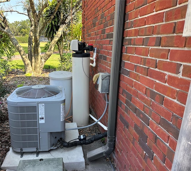 708 E Main St, Wauchula, FL 33873 - details with central air condition unit and brick siding