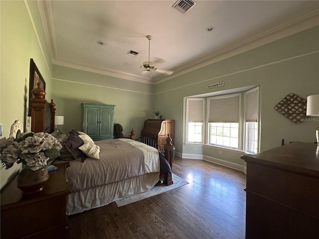 708 E Main St, Wauchula, FL 33873 - bedroom featuring crown molding, visible vents, wood finished floors, and baseboards