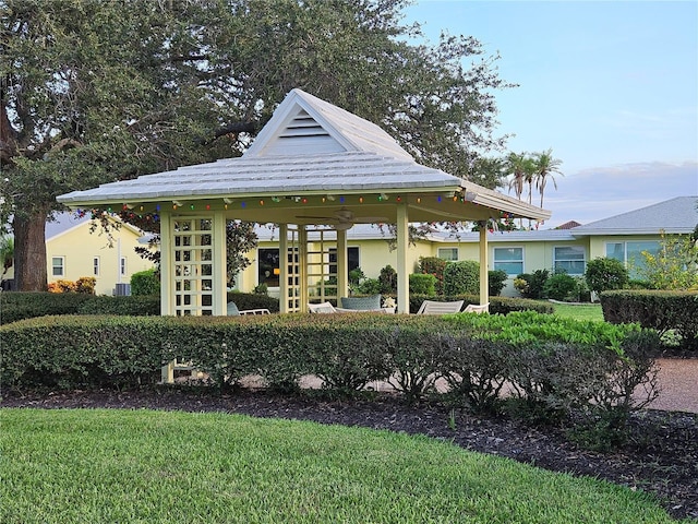 view of community with a gazebo and a lawn