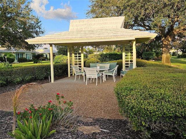 view of patio / terrace featuring stairway and outdoor dining area
