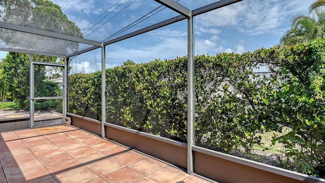 2259 Pueblo Ln Unit V38, Sarasota, FL 34231 - unfurnished sunroom with plenty of natural light