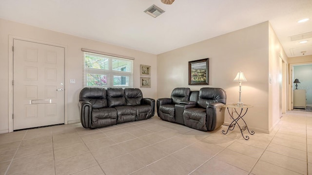 2259 Pueblo Ln Unit V38, Sarasota, FL 34231 - living room featuring light tile patterned floors and baseboards