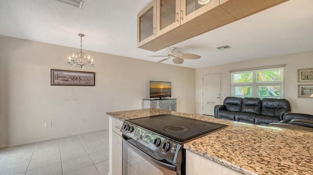 2259 Pueblo Ln Unit V38, Sarasota, FL 34231 - kitchen with black range with electric cooktop, open floor plan, a ceiling fan, light stone countertops, and a chandelier