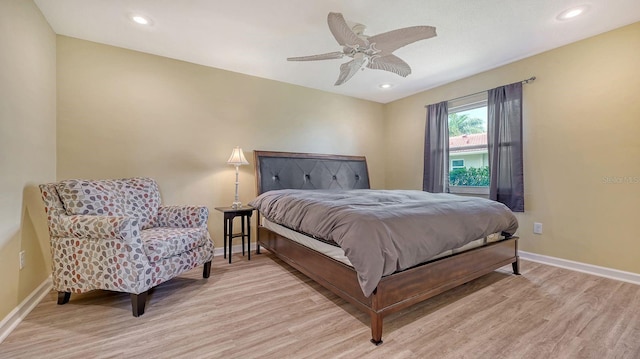 2259 Pueblo Ln Unit V38, Sarasota, FL 34231 - bedroom with wood finished floors, baseboards, a ceiling fan, and recessed lighting