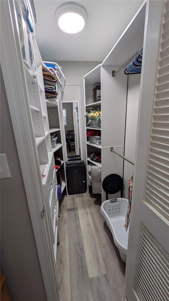 4158 Tamiami Trl Unit V1, Port Charlotte, FL 33952 - spacious closet featuring wood finished floors