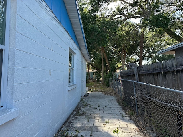 5014 22nd St W, Bradenton, FL 34207 - view of home's exterior featuring fence and a patio area