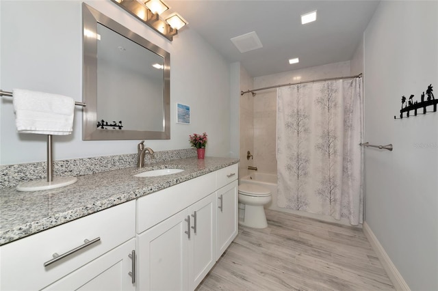 full bath with toilet, shower / bathtub combination with curtain, wood finished floors, and vanity