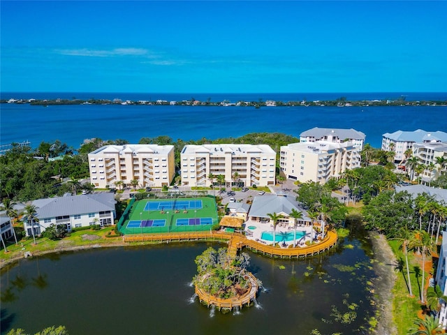 drone / aerial view with a water view